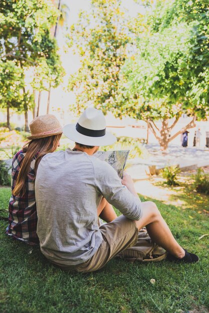 Couple of tourists resting in the park