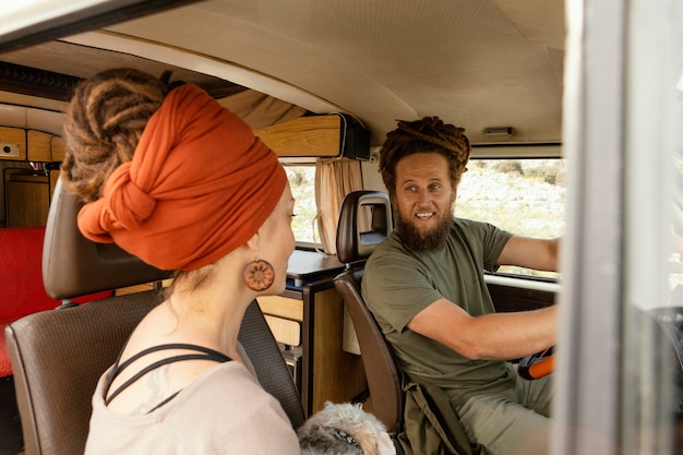 Couple traveling by car