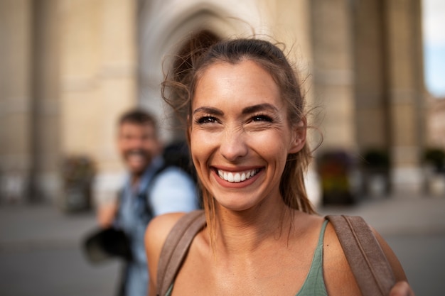 Couple traveling and taking selfie together in the city