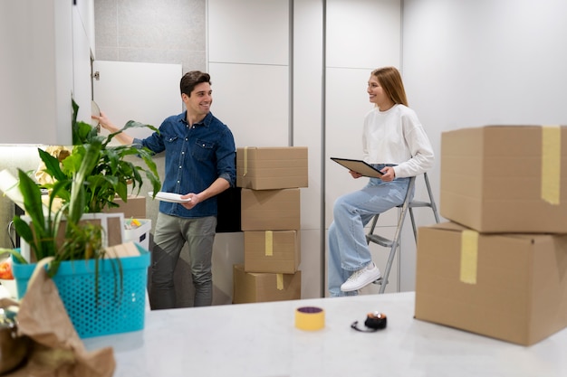 Couple unpacking their belongings