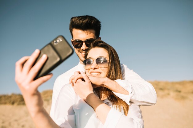 Couple walking on the beach