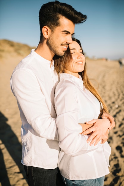 Couple walking on the beach