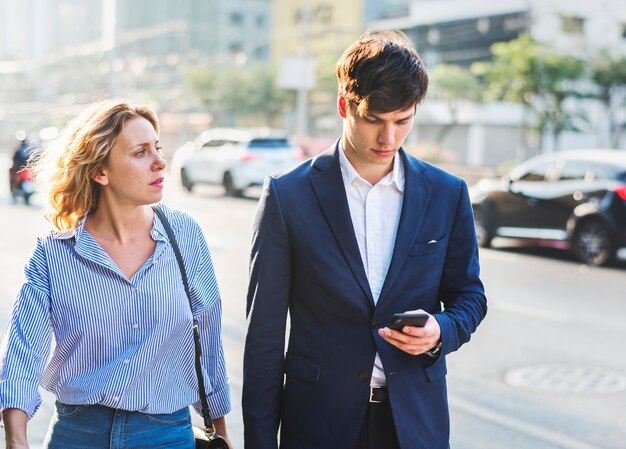 Couple walking on downtown together