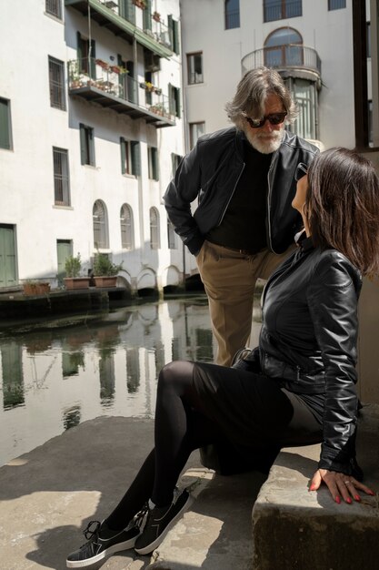 Couple wearing synthetic leather clothing