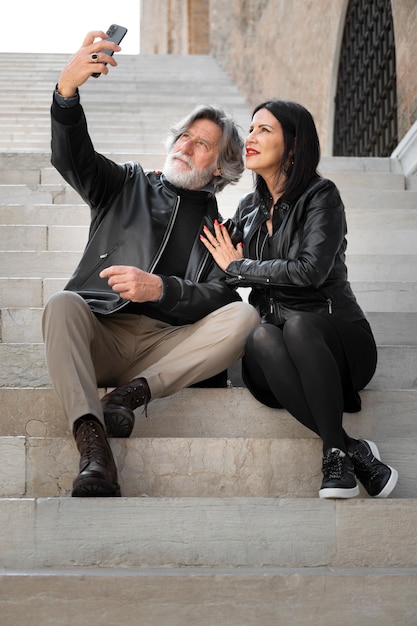 Couple wearing synthetic leather clothing