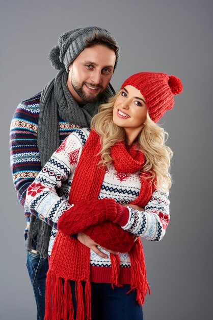 Couple wearing warm winter clothing