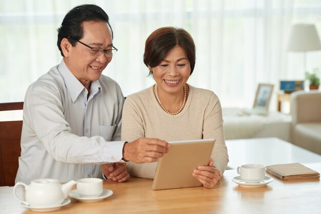 Couple with digital tablet