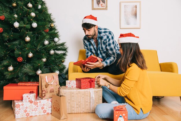 Couple with present boxes