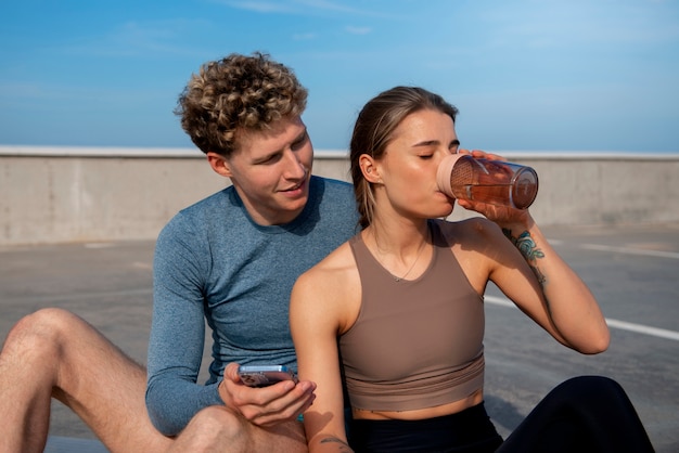 Couple working out together outdoors