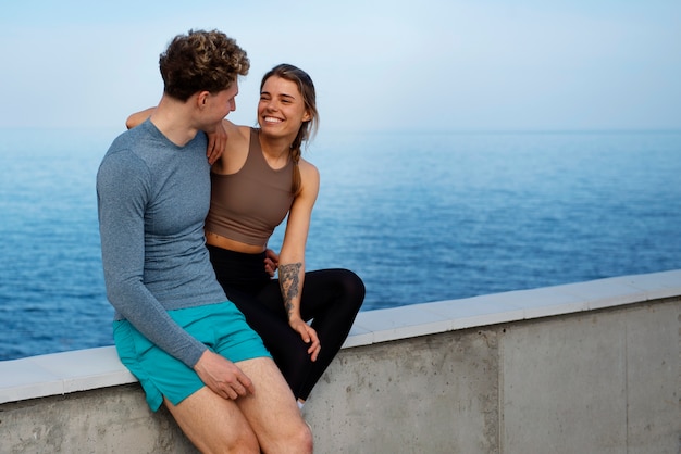 Couple working out together outdoors