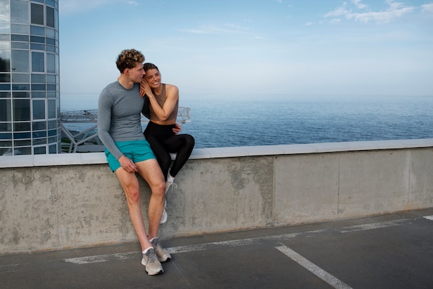 Couple working out together outdoors