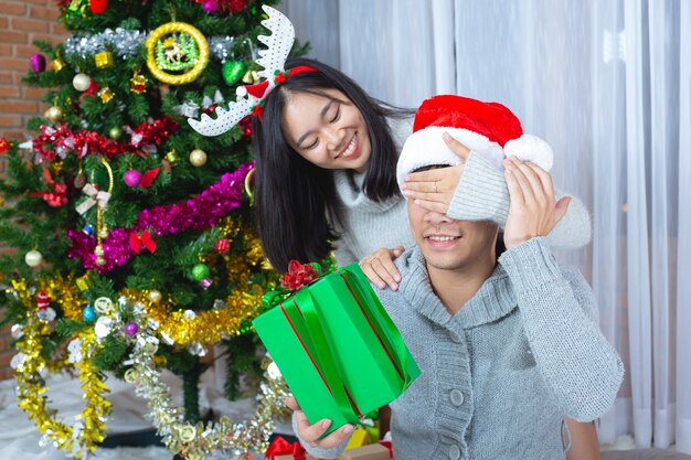 couples enjoying with christmas present