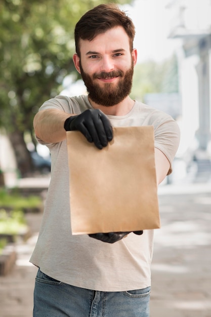 Free photo courier delivering a package