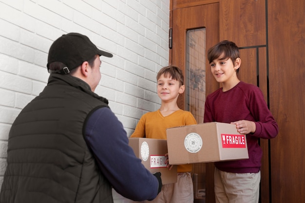 Free photo courier delivering parcel to client