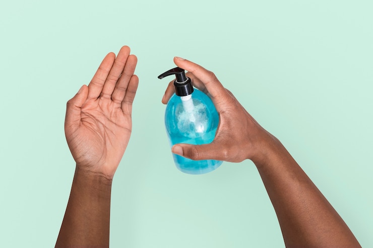 Free Photo covid-19 hand sanitizing in health concept