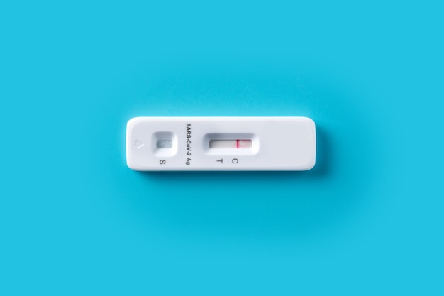 Covid-19 rapid antigen test on blue background