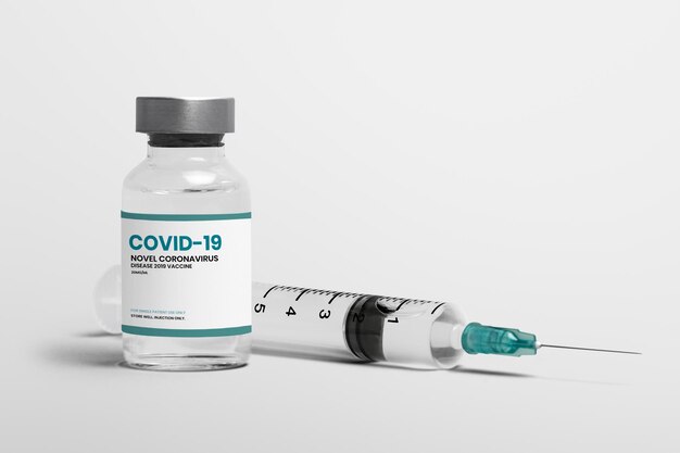 바늘 주사기가 있는 코비드 19 백신 바이알