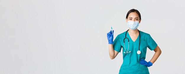 코비드 코로나바이러스 질병 의료 종사자들은 의료 분야에서 자신감 있는 아시아 여성 간호사 의사를 컨셉으로 ...