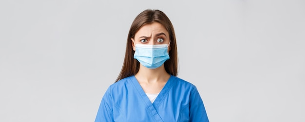 Covid preventing virus health healthcare workers and quarantine concept attractive female doctor or