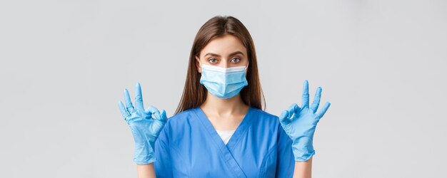 ウイルスの健康医療従事者と検疫の概念の専門の女性看護師を防ぐCovid