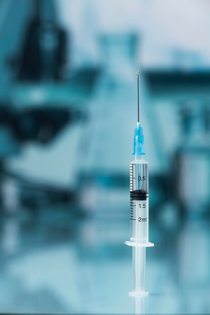 covid still life with vaccine