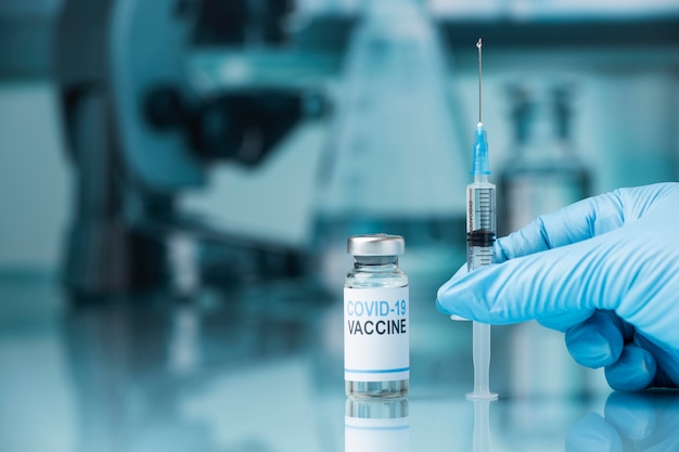covid still life with vaccine