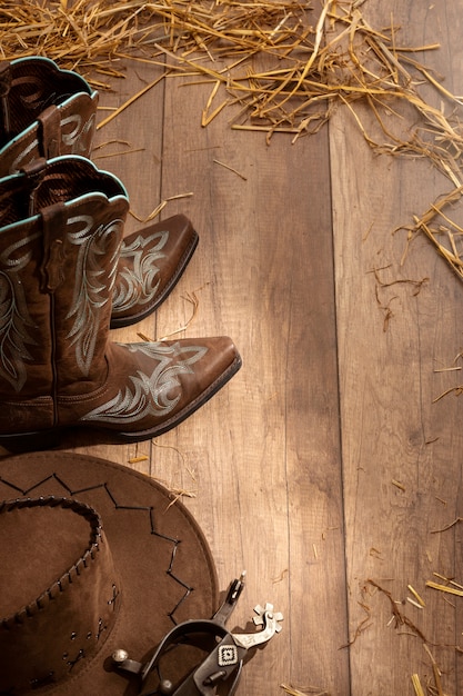 Free photo cowboy inspiration with boots high angle