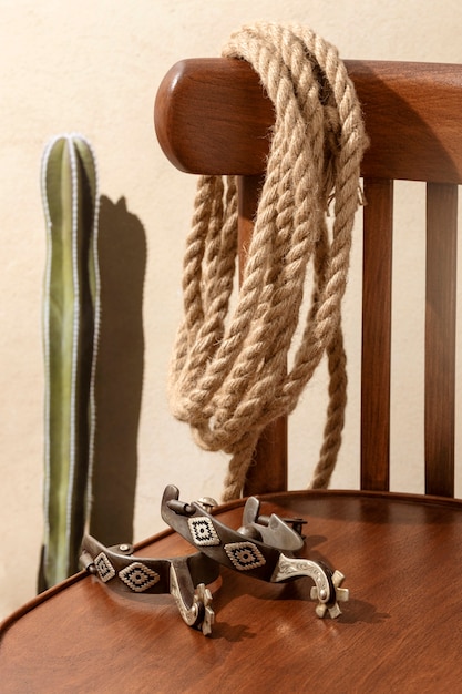 Cowboy inspiration with rope on wooden chair