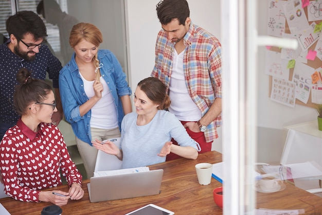 Coworkers working at office in a relaxed atmosphere