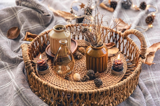 Cozy autumn composition with decorative details candles