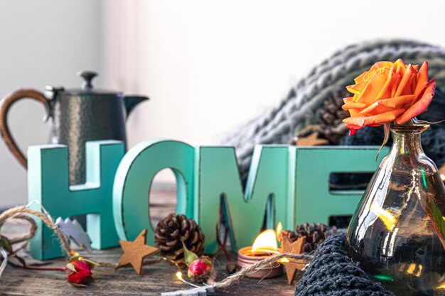 Cozy background with decorative word Home and home decor details