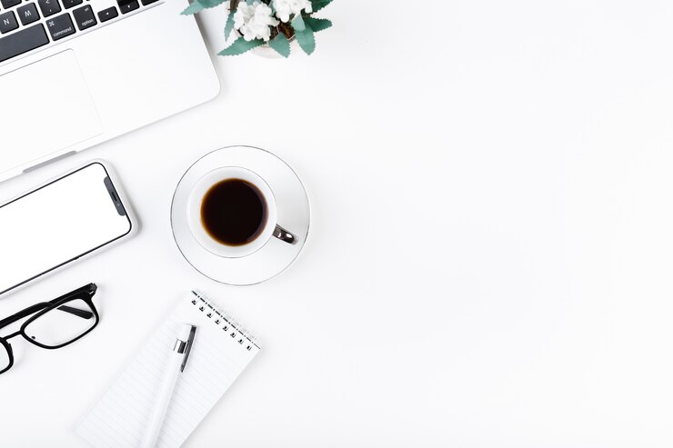 Free Photo cozy desktop with coffee and laptop