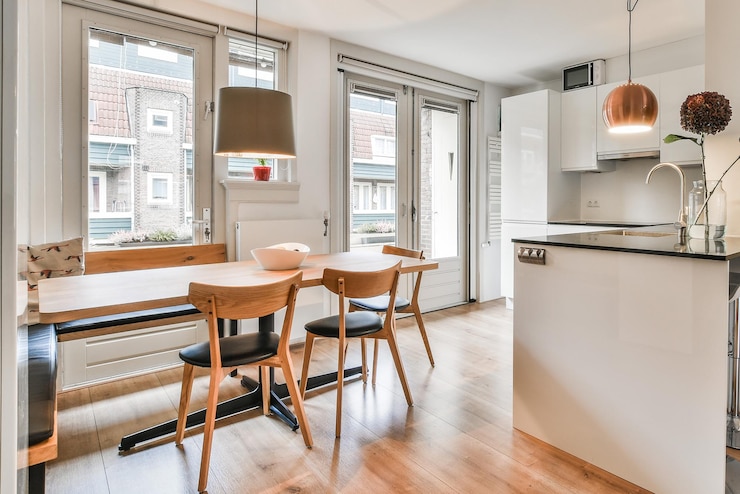 Free Photo cozy dining room of a modern apartment