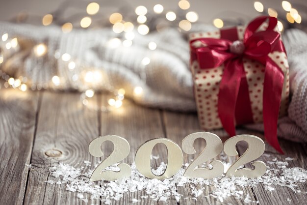 Cozy holiday composition with the numbers  on a blurred background in bokeh