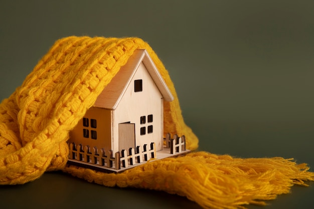 Free photo cozy house concept with wooden toy house