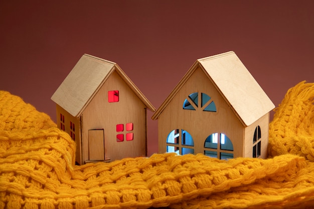 Free photo cozy house concept with wooden toy house