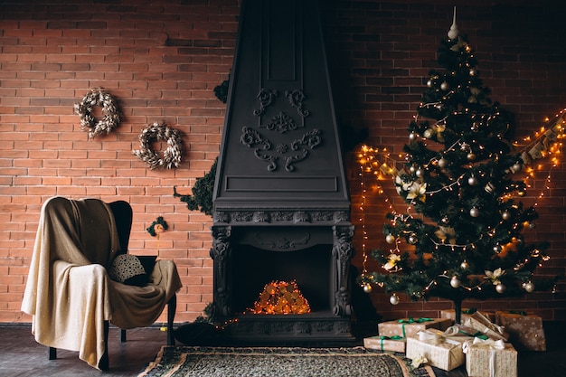 Cozy living room with fireplace and Christmas tree