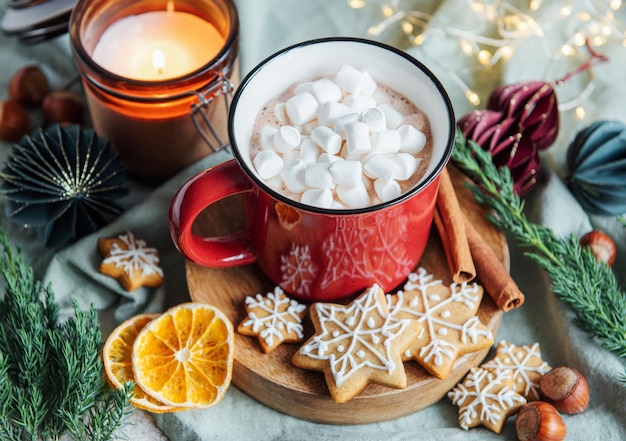 Cozy winter and christmas setting with hot cocoa and homemade cookies