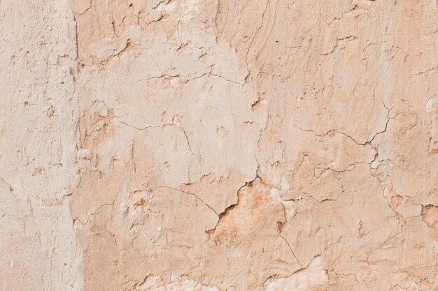 Cracked flaked stucco surface