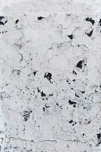 Cracked painted white wall texture