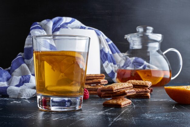 Crackers with a glass of lemonade. 