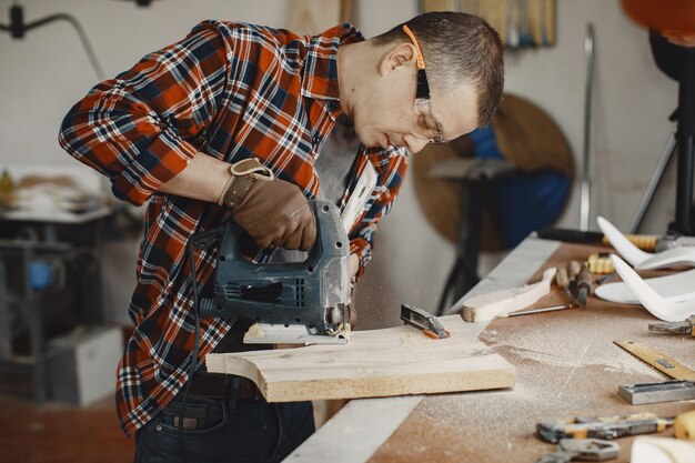 Craftsman using circular saw