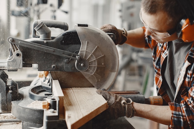 Free photo craftsman using circular saw