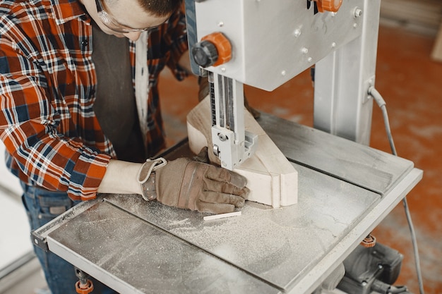 Free photo craftsman using circular saw