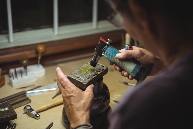 Craftswoman working in workshop