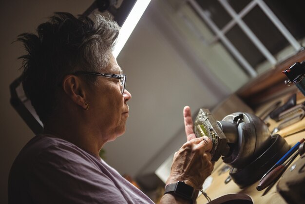 Craftswoman working in workshop