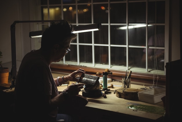 Craftswoman working in workshop