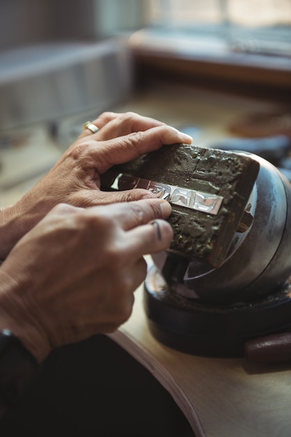 Craftswoman working in workshop