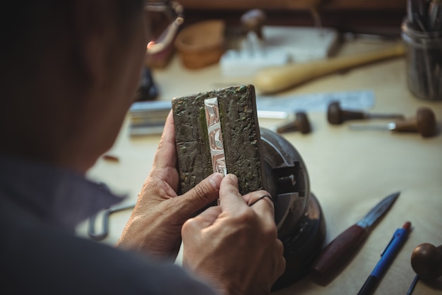 Craftswoman working in workshop