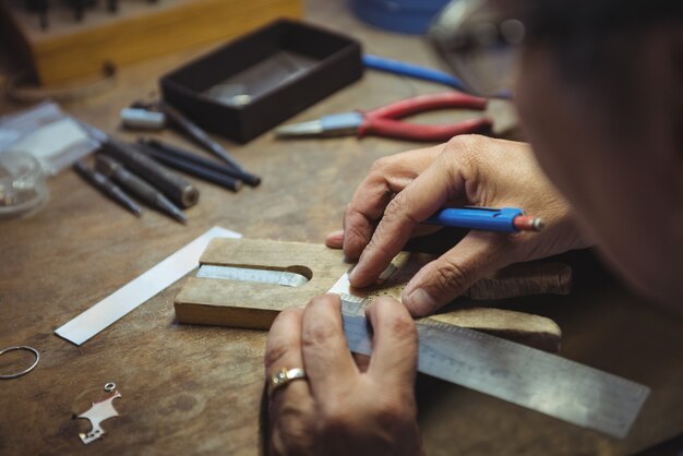 Craftswoman working in workshop